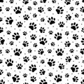 Pet prints. Paw seamless pattern. Cute background for pets, dog or cat. Foot puppy. Black silhouette shape paw. Footprint pet. Ani Royalty Free Stock Photo