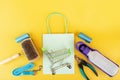 pet shop accessories, supermarket trolley with pet tools on a yellow background, top view, flat lay, dog and cat store
