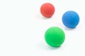 Pet supplies about rubber balls of red, green and blue for pet o Royalty Free Stock Photo