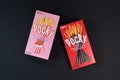 Pocky brand of chocolate sticks on black background.