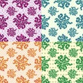 Petals of flowers set of 4 colored seamless geometric patterns on the background