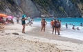 PETANI beach, Greece - July 21, 2020: Tourists take pictures on the Petani beach, Kefalonia island, Ionian sea, Greece.