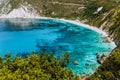 Petani beach in summer, Kefalonia island, Greece. View to Petani bay with transparent and crystal clear blue azure Royalty Free Stock Photo