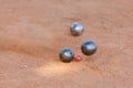 Petanque balls on the ground Royalty Free Stock Photo