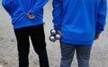 Petanque throwers seen from back Royalty Free Stock Photo