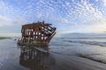 Waves coming up to the old shipwreck in Oregon.