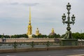 Peter and Paul cathedral and lamp on Trinity Troitsky bridge, Saint Petersburg, Russia Royalty Free Stock Photo