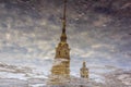 Peter and Paul cathedral in puddle reflection