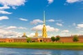 The Peter and Paul Fortress, Saints Peter and Paul Cathedral Orthodox church gold spire, fortress walls on Zayachy Hare Island Royalty Free Stock Photo