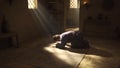 Peter prostrated on ground to pray in biblical era, sunlight through window