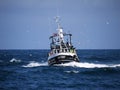 Fishing Boat Underway at Sea. Royalty Free Stock Photo