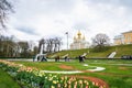 Peterhof fountains and palace view and tourists in Saint Petersburg