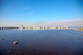 View of the Gulf of Finland horizon with a mansion on a small island in the Peterhof Museum. Spring Sunny day. St. Petersburg, Rus