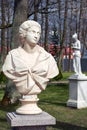 Peterhof, Russia, May 4-Antique statue in the summer garden in the sunlight