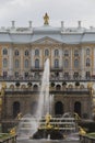 Fountains alley water canal with Grand Cascade and Samson Fountain golden sculpture, the palace in the background