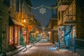 Petit-Champlain Street, Christmas decorations, snowy night, Old Quebec, Canada Royalty Free Stock Photo