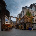 Petit Paris in the Koestraat, a street with up level restaurants in Maastricht, decorated and illuminated with lights