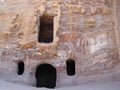 Doors and windows of a rock-cut tomb in Petra Mountain, Jordan Royalty Free Stock Photo