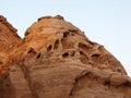 Eroded reddish rocks in Petra Mountain, Jordan