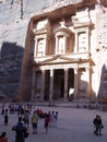 Vertical view of tourists next to the Treasury in Petra, Jordan