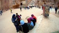 Arab women tourists view the canyon ancient city of Petra in Jordan Royalty Free Stock Photo