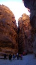 Tourists view the canyon ancient city of Petra in Jordan