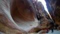 Tourists view the canyon ancient city of Petra in Jordan