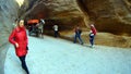 Tourists view the canyon ancient city of Petra in Jordan
