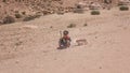 Little boy, jordanian sells souvenirs. Childrens work. Travel genre photography in Petra Jordan