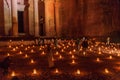 PETRA, JORDAN - MARCH 22, 2017: Tourists observe the Al Khazneh temple (The Treasury) during Petra by Night in the ancient city Royalty Free Stock Photo