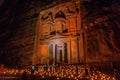 PETRA, JORDAN - MARCH 22, 2017: Tourists visit the Al Khazneh temple (The Treasury) during Petra by Night in the ancient city Royalty Free Stock Photo