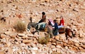 Children live with tourists money for donkey ride