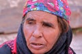 PETRA, JORDAN - NOVEMBER 17, 2010: Portrait of an old bedouin woman with colorful dress Royalty Free Stock Photo