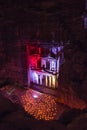 Petra at night, colored lighting illumination, treasury monument Al-Khazneh in the archaeological site of Petra, Jordan. Royalty Free Stock Photo