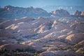 Petrified Dunes at Arches National Park are old sand dunes turned to stone and rock over time. Taken during sunrise Royalty Free Stock Photo