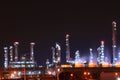 Petrochemical oil refinery plant shines at night, Royalty Free Stock Photo