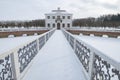 View of the Marly Palace on the Sector Pond on a cloudy February day. Peterhof