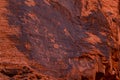 Petroglyphs of an ancient people carved on red sandstone in the Valley of Fire, Nevada, USA. Glyph symbols as means of