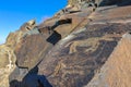 Petroglyphs on the stone Royalty Free Stock Photo