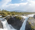 Petrohue Falls and Osorno Volcano with its snowy peak near Puerto Varas, Chile Royalty Free Stock Photo