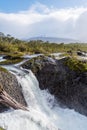 Petrohue Falls and Osorno Volcano with its snowy peak near Puerto Varas, Chile Royalty Free Stock Photo