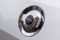 A petrol cap cover on a modern white car. The fuel tank of the modern sports car, close up view Royalty Free Stock Photo