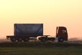 Petrol cargo truck driving on highway hauling oil products. Delivery transportation and logistics concept Royalty Free Stock Photo