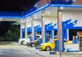 Petrol gas station in blue at night with lights Royalty Free Stock Photo