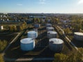 Petrol industrial zone. Aerial view of round tanks