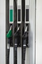 Petrol pump filling nozzles at gas station, nobody. Fuel pumps, self service Royalty Free Stock Photo