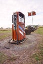 Petrol pumps at abandoned derelict service station.