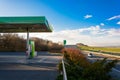 Petrol station on the motorway. Sunset at the gas station. Car traveling on the highway at sunset. Maximal speed. Sunset on the mo Royalty Free Stock Photo