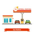 Petrol station with two cars