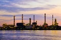 Petroleum oil refinery factory over sunrise Royalty Free Stock Photo